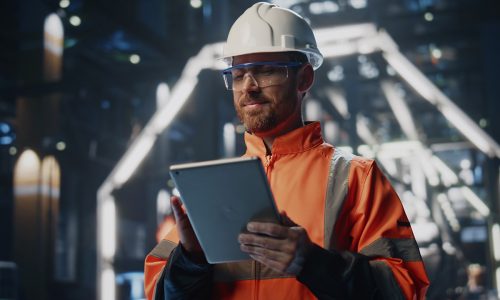 Work on tablet with a hard hat